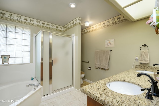 full bathroom featuring tile patterned floors, vanity, toilet, and shower with separate bathtub