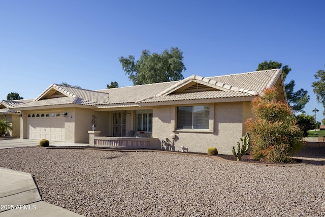 single story home featuring a garage