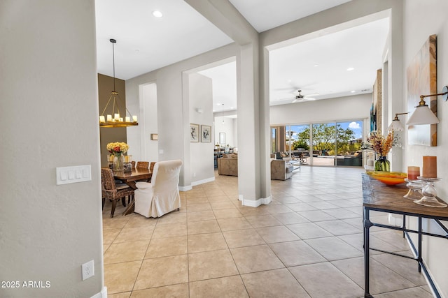 37308 N 100th Pl, Scottsdale, AZ 85262 - interior space featuring light tile patterned floors, recessed lighting, baseboards, and ceiling fan with notable chandelier