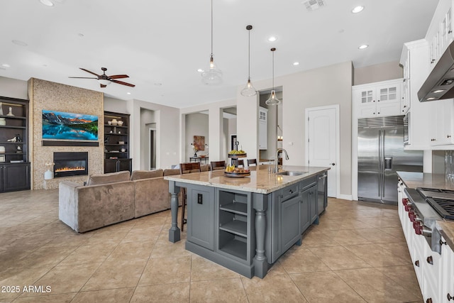 37308 N 100th Pl, Scottsdale, AZ 85262 - kitchen with gray cabinetry, a sink, white cabinets, and appliances with stainless steel finishes