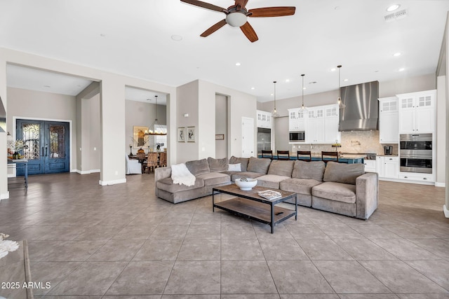 37308 N 100th Pl, Scottsdale, AZ 85262 - living room featuring recessed lighting, ceiling fan, tile patterned floors, visible vents, and baseboards
