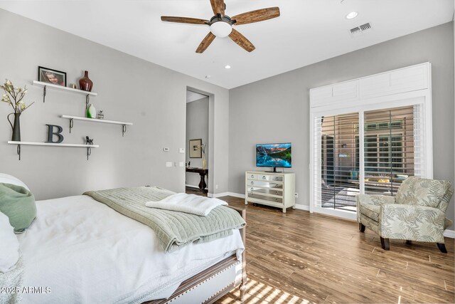 37308 N 100th Pl, Scottsdale, AZ 85262 - bedroom with recessed lighting, wood finished floors, access to exterior, baseboards, and visible vents