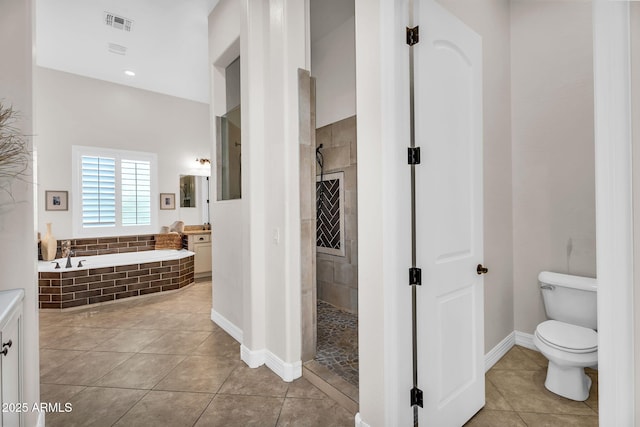 37308 N 100th Pl, Scottsdale, AZ 85262 - full bathroom featuring vanity, a garden tub, tile patterned floors, toilet, and walk in shower