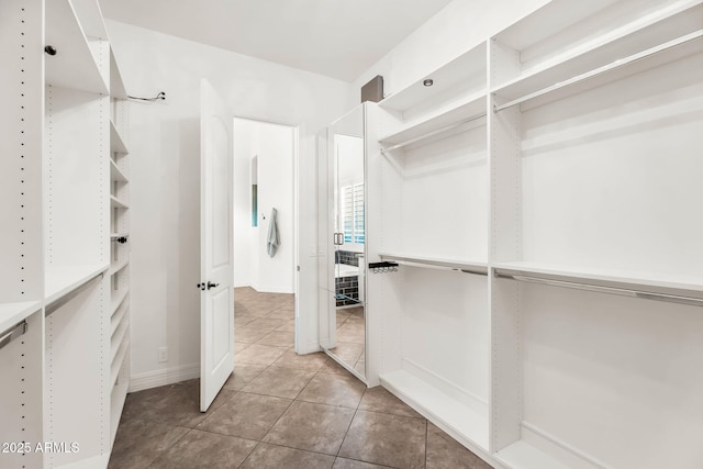37308 N 100th Pl, Scottsdale, AZ 85262 - spacious closet featuring light tile patterned flooring