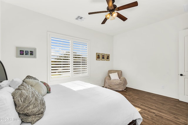 37308 N 100th Pl, Scottsdale, AZ 85262 - bedroom featuring visible vents, baseboards, ceiling fan, and dark wood finished floors
