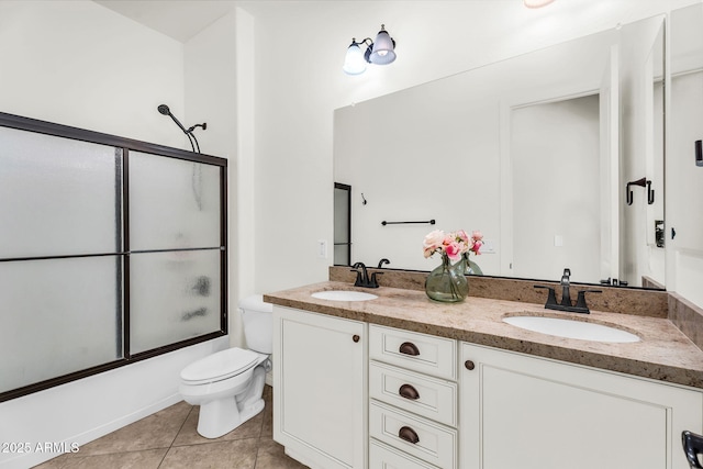37308 N 100th Pl, Scottsdale, AZ 85262 - full bath with toilet, a sink, shower / bath combination with glass door, and tile patterned floors