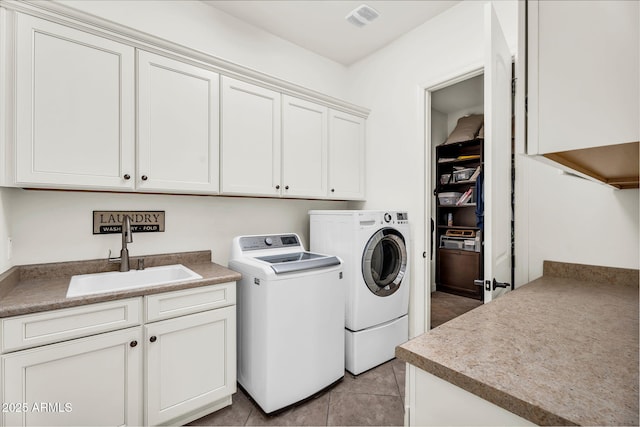 37308 N 100th Pl, Scottsdale, AZ 85262 - laundry room featuring a sink, visible vents, light tile patterned flooring, washer and dryer, and cabinet space
