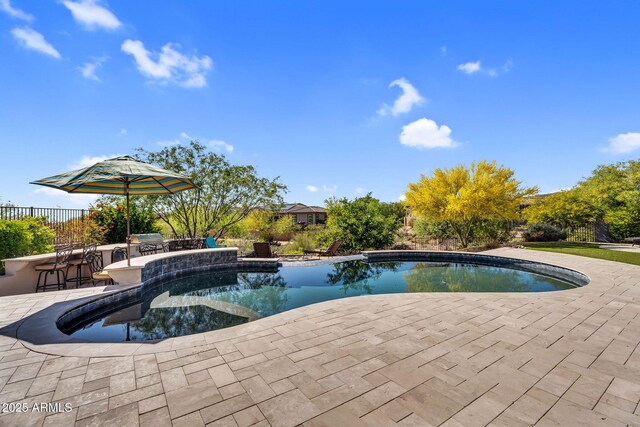 37308 N 100th Pl, Scottsdale, AZ 85262 - view of pool featuring a patio, a fenced in pool, and outdoor dry bar