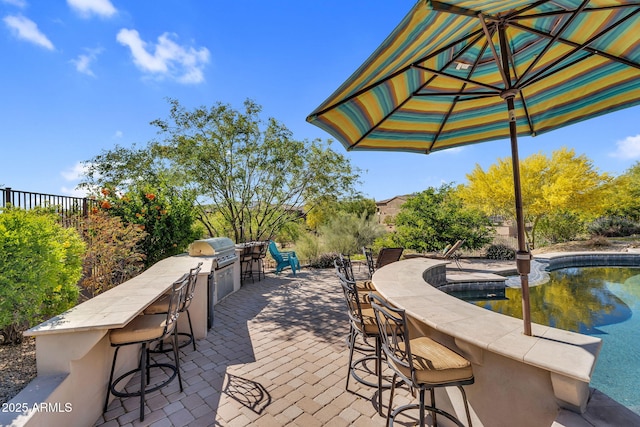 37308 N 100th Pl, Scottsdale, AZ 85262 - view of patio / terrace featuring an outdoor kitchen, outdoor wet bar, and grilling area