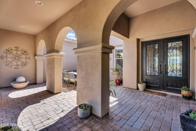37308 N 100th Pl, Scottsdale, AZ 85262 - doorway to property featuring a patio, french doors, outdoor dining area, and stucco siding