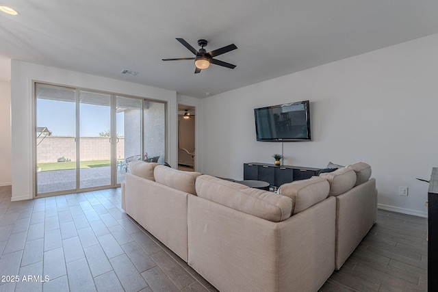 6117 S Adelle, Mesa, AZ 85212 - living room with ceiling fan, visible vents, baseboards, and wood finished floors