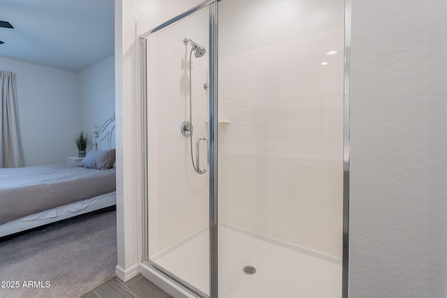 6117 S Adelle, Mesa, AZ 85212 - full bath with a textured wall, a stall shower, and connected bathroom