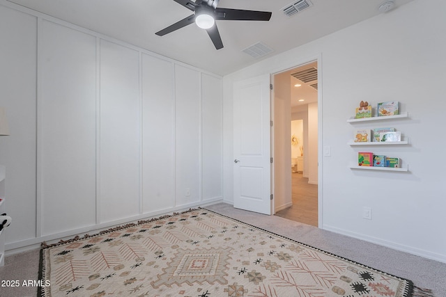 6117 S Adelle, Mesa, AZ 85212 - unfurnished bedroom featuring visible vents, a ceiling fan, a closet, and light carpet