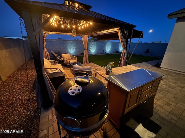 6117 S Adelle, Mesa, AZ 85212 - patio at twilight with a gazebo and a fenced backyard