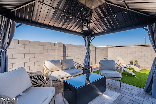 6117 S Adelle, Mesa, AZ 85212 - view of patio / terrace with an outdoor living space and a fenced backyard