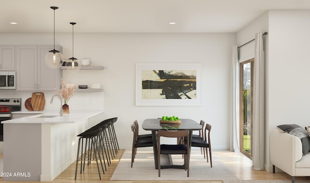 dining room featuring light wood-type flooring