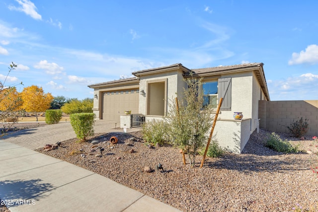 view of front of home with a garage