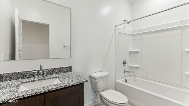 full bathroom with toilet, washtub / shower combination, and vanity