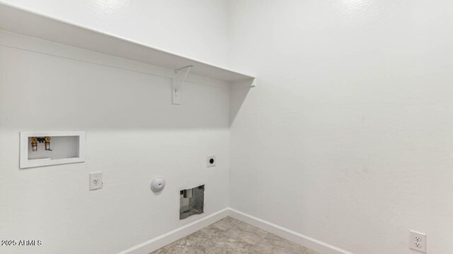 clothes washing area with washer hookup, hookup for a gas dryer, hookup for an electric dryer, laundry area, and baseboards