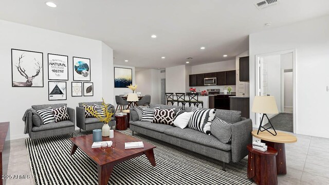 living room with recessed lighting, visible vents, and light tile patterned floors