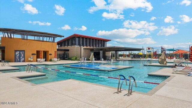 community pool featuring a patio area