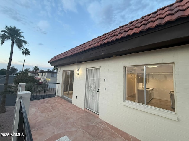 view of patio with a balcony