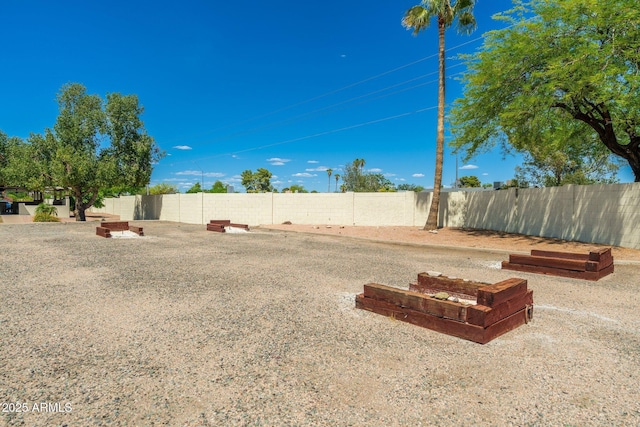 view of yard with fence