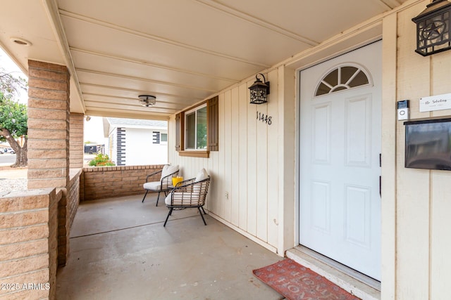 entrance to property with covered porch