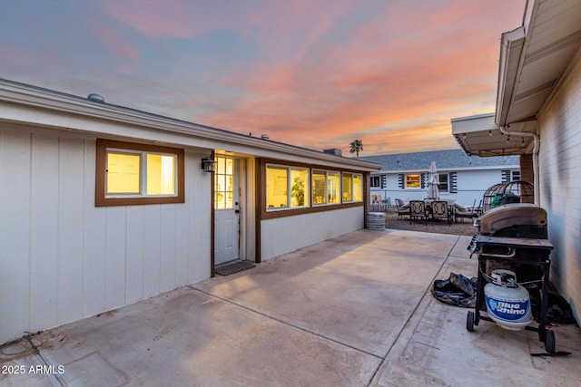 view of patio featuring a grill