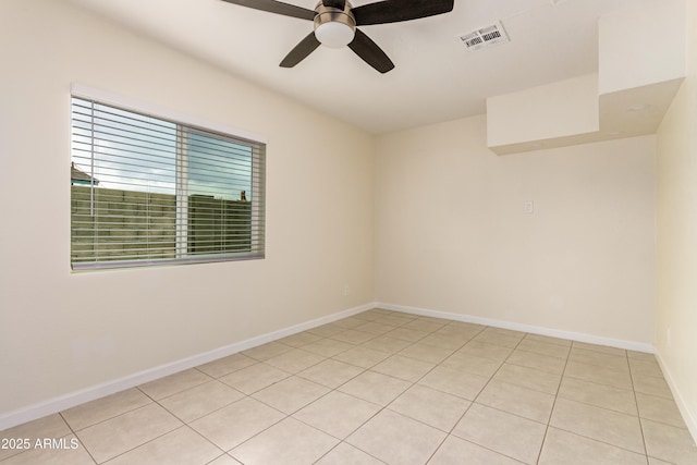 2130 W Colter St, Phoenix, AZ 85015 - spare room featuring a ceiling fan, light tile patterned floors, and baseboards