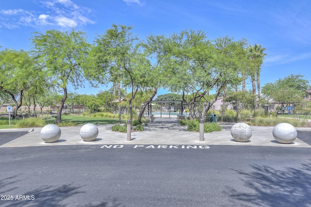 view of front of home featuring a community pool