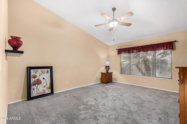 unfurnished living room with carpet floors, ceiling fan, and lofted ceiling