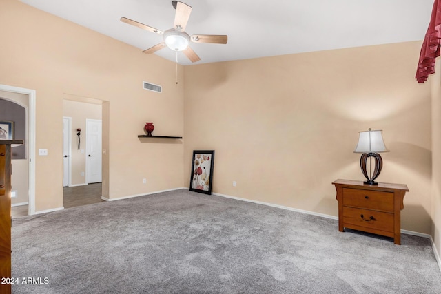 interior space featuring carpet floors and ceiling fan