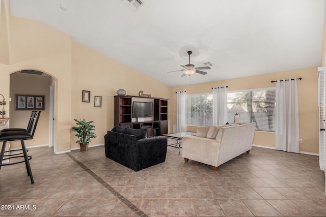 living room featuring ceiling fan, light tile patterned floors, and high vaulted ceiling