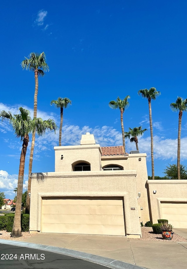 view of front of property featuring a garage