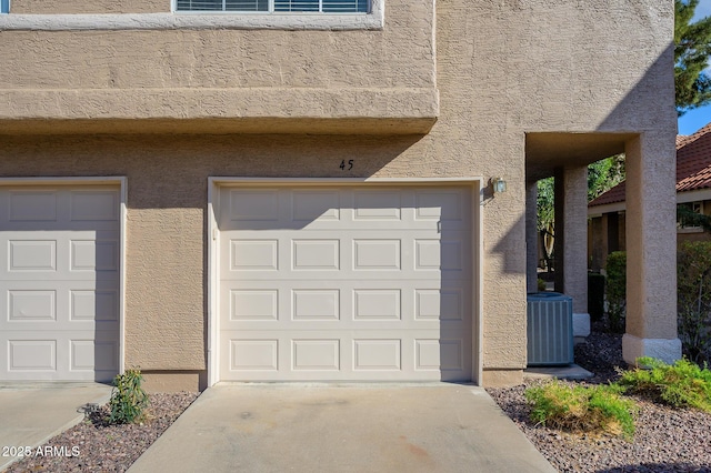 garage with central AC unit