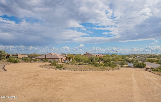 26215 N 115th Ave, Peoria, AZ 85383 - view of home's community with dirt driveway