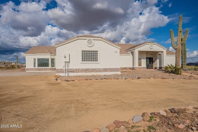 26215 N 115th Ave, Peoria, AZ 85383 - view of front of house with stucco siding and a tiled roof
