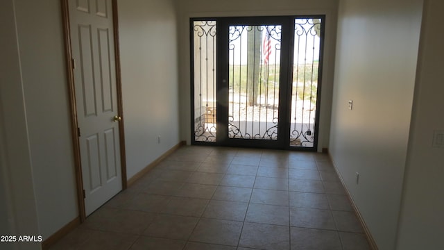 26215 N 115th Ave, Peoria, AZ 85383 - foyer featuring baseboards, tile patterned flooring, and french doors