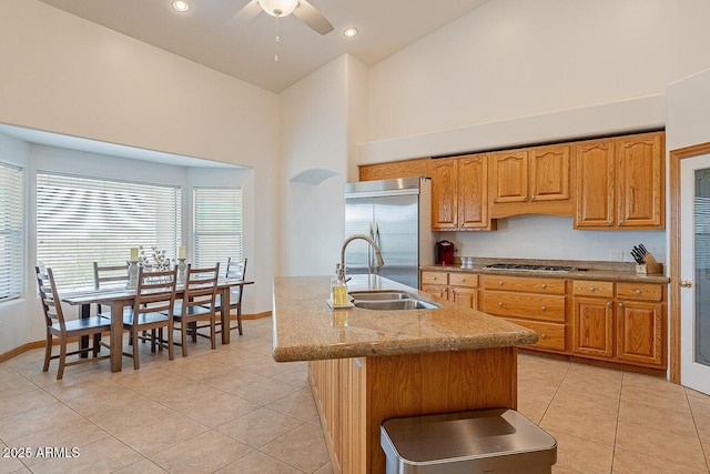 26215 N 115th Ave, Peoria, AZ 85383 - kitchen featuring stainless steel built in fridge, gas stovetop, a sink, ceiling fan, and light tile patterned floors
