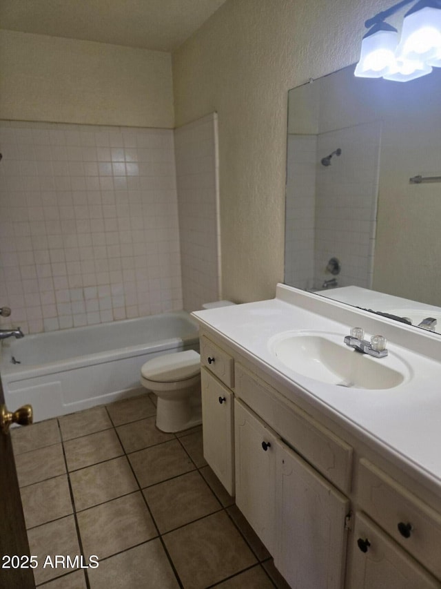 full bathroom with shower / bathing tub combination, a textured wall, tile patterned flooring, and toilet
