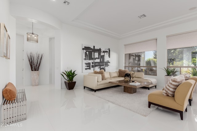 living room with a notable chandelier