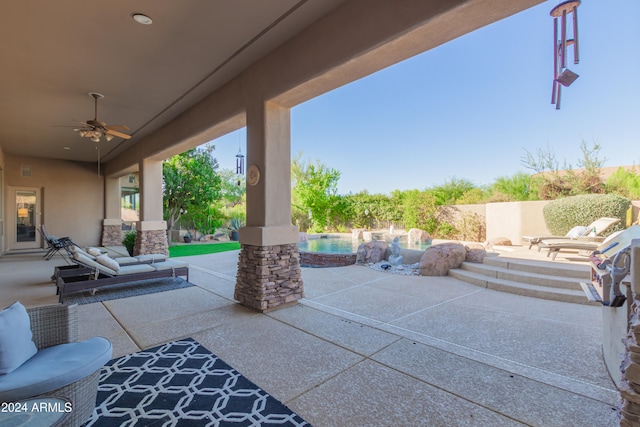 view of patio / terrace featuring ceiling fan