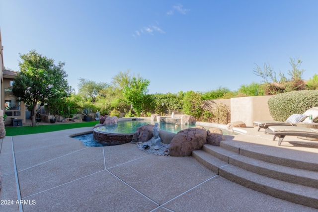 view of swimming pool featuring a patio