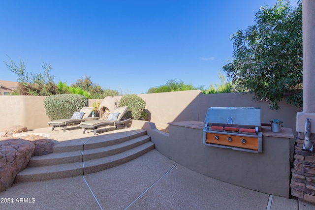 view of patio / terrace featuring area for grilling and grilling area