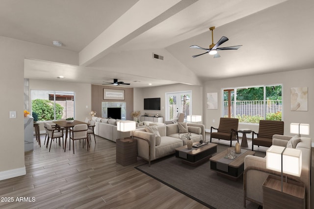 4913 E Acoma Dr, Scottsdale, AZ 85254 - living area featuring a ceiling fan, a fireplace, wood finished floors, baseboards, and lofted ceiling