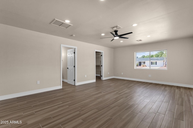 4913 E Acoma Dr, Scottsdale, AZ 85254 - spare room featuring dark wood finished floors, recessed lighting, baseboards, and a ceiling fan