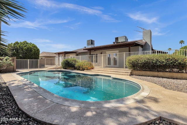 4913 E Acoma Dr, Scottsdale, AZ 85254 - view of swimming pool featuring central AC
