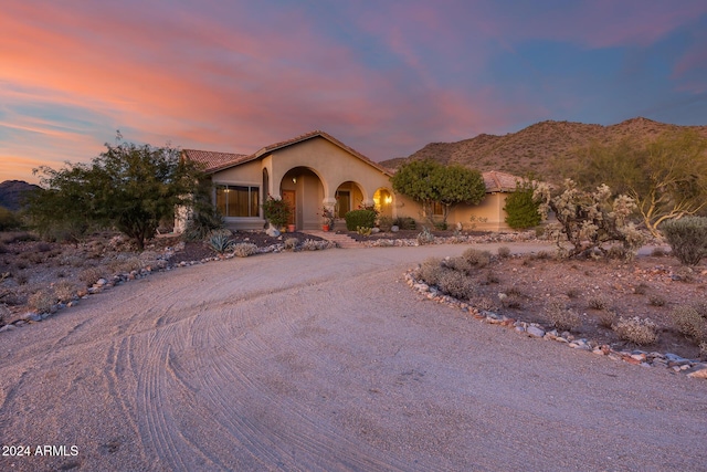 mediterranean / spanish-style home featuring a mountain view