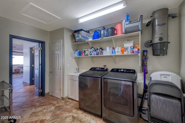 3298 W Monte Vista Trl, Benson, AZ 85602 - clothes washing area featuring attic access, baseboards, and washer and dryer